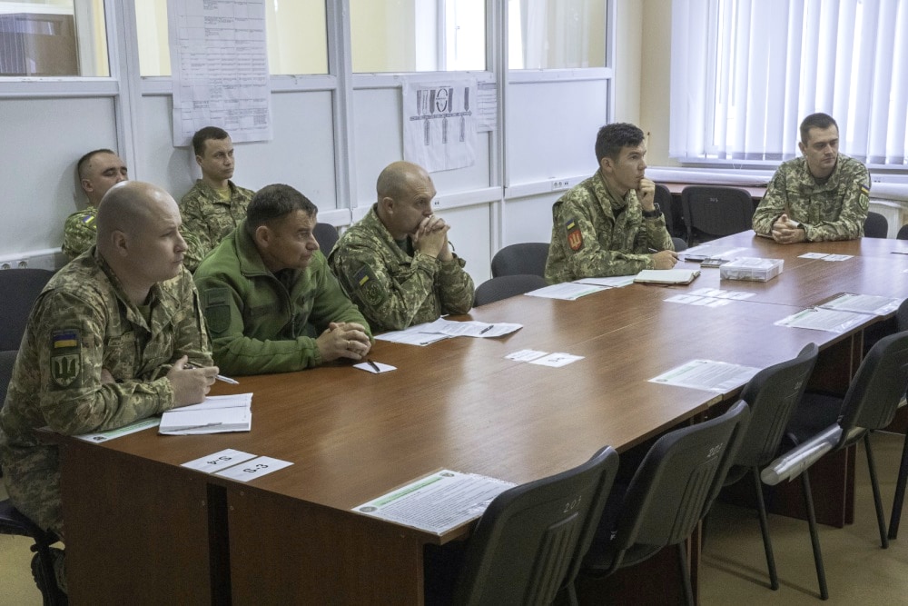 Ukrainian military advisors prepare for a joint exercise